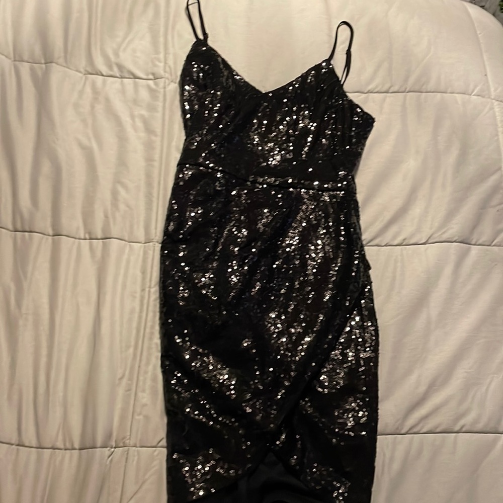 Wore it once for a school dance, in great condition, easy to adjust